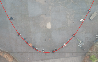 Bild der Schüler_innen in GeoGebra mit einer Parabel überlagert